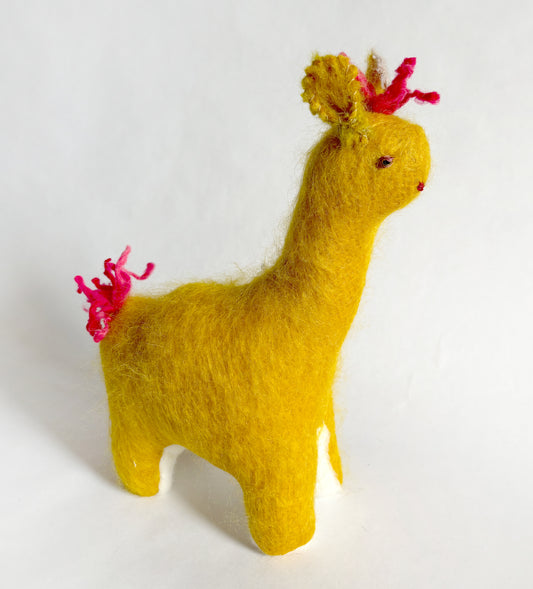 Llama in mustard with funny Mohair-do